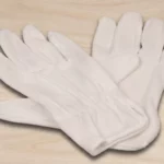 Trägerhandschuhe mit Noppen aus weißem Baumwoll-Trikot